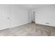 Cozy bedroom featuring soft carpet and door leading to additional space at 12536 Lowery Way, Fishers, IN 46037