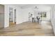 Bright dining area featuring hardwood floors and large windows at 12536 Lowery Way, Fishers, IN 46037