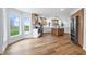 Bright kitchen with island, stainless steel appliances, and a large window with backyard views at 12536 Lowery Way, Fishers, IN 46037