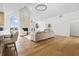 Spacious living room showcasing a stone fireplace and hardwood floors at 12536 Lowery Way, Fishers, IN 46037