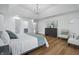 This main bedroom features hardwood floors, recessed lighting and en-suite bathroom at 12536 Lowery Way, Fishers, IN 46037