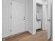Mudroom features a utility sink, custom cabinetry, and exterior access at 12536 Lowery Way, Fishers, IN 46037