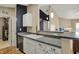 Charming kitchen featuring modern sink, stainless steel dishwasher and plenty of counter space at 12588 Tennyson Ln # 205, Carmel, IN 46032