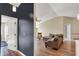 Spacious living area with wood floors, neutral walls, and a comfortable seating arrangement at 12588 Tennyson Ln # 205, Carmel, IN 46032