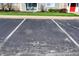 Paved parking spaces for residents are near to the condos at 12588 Tennyson Ln # 205, Carmel, IN 46032