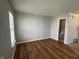 Bright bedroom featuring hardwood floors, ample natural light, and a nearby bathroom at 12657 Republic Dr, Fishers, IN 46037