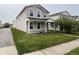 Charming two-story home featuring a well-maintained front yard and inviting porch at 12657 Republic Dr, Fishers, IN 46037