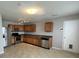 Bright kitchen featuring stainless steel appliances, wooden cabinets, and ample counter space at 12657 Republic Dr, Fishers, IN 46037