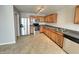 Modern kitchen with stainless steel appliances, wooden cabinets, and great lighting at 12657 Republic Dr, Fishers, IN 46037