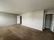 Large living room featuring neutral walls and plush carpeting at 12657 Republic Dr, Fishers, IN 46037