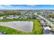 Beautiful aerial view of homes surrounding a pond with fountain in a well maintained community at 132 Oakhurst Way, Westfield, IN 46074