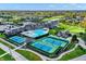 Aerial view of clubhouse and community amenities including a pool and tennis courts at 132 Oakhurst Way, Westfield, IN 46074