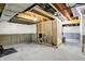 Unfinished basement space with exposed ceiling and a separate unfinished room at 132 Oakhurst Way, Westfield, IN 46074