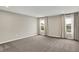 Bright bedroom with neutral walls, carpeted floors, and large windows with backyard views at 132 Oakhurst Way, Westfield, IN 46074