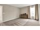 Bedroom featuring plush carpeting, a neutral color scheme, and a large window with curtains at 132 Oakhurst Way, Westfield, IN 46074