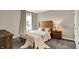 This bedroom is complete with plush carpeting, neutral colors and a window with bright natural light at 132 Oakhurst Way, Westfield, IN 46074