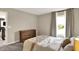 Bedroom featuring plush carpeting and a large window with curtains at 132 Oakhurst Way, Westfield, IN 46074
