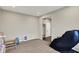 Spacious bonus room featuring plush carpeting, recessed lighting, and an adjacent mudroom at 132 Oakhurst Way, Westfield, IN 46074
