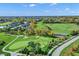 Aerial view of golf course with manicured greens and mature trees at 132 Oakhurst Way, Westfield, IN 46074