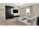 Comfortable living room with contemporary design, modern lighting, and a window view at 132 Oakhurst Way, Westfield, IN 46074