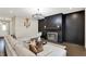 Inviting living room with a stylish fireplace, comfortable sofa, and elegant decor at 132 Oakhurst Way, Westfield, IN 46074