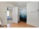 Bright bathroom leading to bedroom featuring tile floors and a blue shower curtain at 1330 Redwood Dr, Greenfield, IN 46140