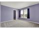Bedroom with a walk-in closet, and carpeted floors at 1330 Redwood Dr, Greenfield, IN 46140