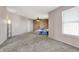 Bedroom with a ceiling fan, window with blinds, and one accent wall, and a large carpeted area at 1330 Redwood Dr, Greenfield, IN 46140