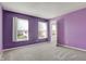 Bedroom with a large window and light purple walls at 1330 Redwood Dr, Greenfield, IN 46140