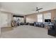 Spacious living room with plush carpeting, abundant natural light, and a cozy seating area at 1330 Redwood Dr, Greenfield, IN 46140