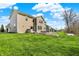Large backyard with a paver patio and a built in firepit perfect for enjoying the outdoors at 13314 Lansbury Ln, Fishers, IN 46037