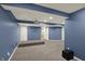 Finished basement featuring an open layout, projector, and neutral carpeting at 13314 Lansbury Ln, Fishers, IN 46037