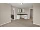 Neutral-toned room featuring built in cabinets and space for a desk at 13314 Lansbury Ln, Fishers, IN 46037
