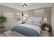 Cozy bedroom features a comfortable bed, neutral color palette, and bright natural light at 13314 Lansbury Ln, Fishers, IN 46037