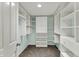 Organized walk-in closet with custom shelving and storage solutions at 13314 Lansbury Ln, Fishers, IN 46037