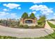 Attractive brick community sign with lush landscaping, creating a welcoming entrance at 13314 Lansbury Ln, Fishers, IN 46037