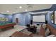 Finished basement features a pool table and a movie screen, perfect for entertaining friends and Gathering at 13314 Lansbury Ln, Fishers, IN 46037