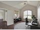 Well-lit home office featuring a vaulted ceiling and large arched window at 13314 Lansbury Ln, Fishers, IN 46037