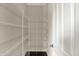 Walk-in pantry with white wire shelving for ample storage at 13314 Lansbury Ln, Fishers, IN 46037
