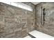Tiled shower featuring a bench, a hand shower and an overhead rain shower head at 13314 Lansbury Ln, Fishers, IN 46037