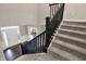 Staircase showcasing the home's entrance and a view of the open floor plan at 13314 Lansbury Ln, Fishers, IN 46037
