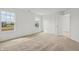 Bright empty bedroom with carpeted floors and two windows at 13418 Vickery Ridge Dr, Fishers, IN 46037