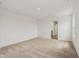 Empty bedroom with carpeted floors and a view into the bathroom at 13418 Vickery Ridge Dr, Fishers, IN 46037