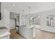 Kitchen with island, stainless appliances, dishwasher and sliding glass door to the backyard at 13418 Vickery Ridge Dr, Fishers, IN 46037