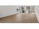 Bright, open living area with hardwood flooring and stainless steel appliances at 13418 Vickery Ridge Dr, Fishers, IN 46037