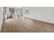 Spacious living area with hardwood floors and an open layout with recessed lighting and kitchen at 13418 Vickery Ridge Dr, Fishers, IN 46037