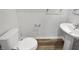 Clean half-bathroom with modern fixtures, including a pedestal sink and toilet at 13813 N Hawkers Hill Dr, Camby, IN 46113
