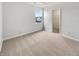 Simple bedroom offers natural light, soft carpeting and a calming atmosphere at 13813 N Hawkers Hill Dr, Camby, IN 46113
