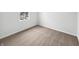 Bright bedroom with a view featuring plush carpeting and fresh white walls at 13813 N Hawkers Hill Dr, Camby, IN 46113