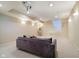 Finished basement with a projector screen and comfortable seating at 13933 Wildcat Dr, Carmel, IN 46033